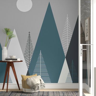 Get a fresh look without putting down any paint with this non-pasted wallpaper. Made from paper with a matte finish, it features a geometric pattern with tall triangles forming mountains and trees in shades of blue, white, and gray. Non-pasted wallpaper offers the chance to make a lasting upgrade to your bedroom, living room, or accent wall. Installation is easy: Simply paint adhesive on your desired wall, press the paper onto a smooth surface, and align the pattern from panel to panel. Our favo Scandinavian Wallpaper, Mountain Wallpaper, Style Deco, Childrens Room Decor, Wallpaper Bedroom, Geometric Wallpaper, Geometric Wall, Kids Wallpaper, Shop Logo