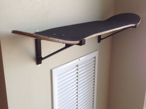 I designed some brackets to turn a worn out skateboard deck into a shelf. (Command strips did not work for me, had to install nail holes) Skateboard Shelf, Skateboard Shelves, Skateboard Room, Skateboard Furniture, Skateboard Decor, Skateboard Design, Skateboard Decks, Kids' Room, My New Room