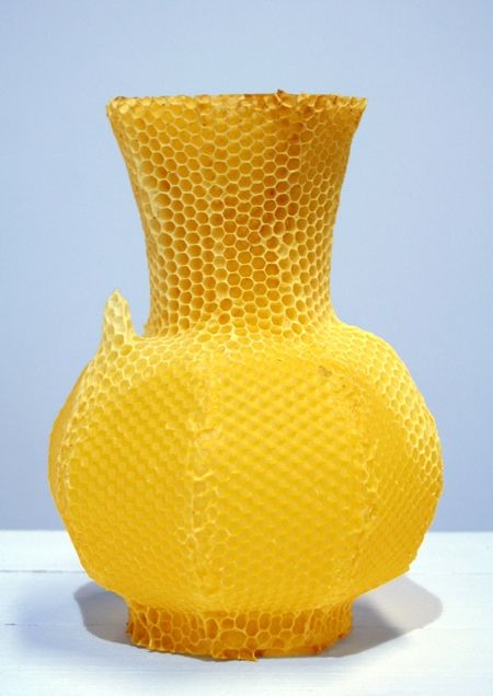 A honeycomb vase, made by bees!   "Libertiny made a vase-shaped hive that the bees then colonised, building a hexagon comb around it. The wax sheets used to make the hive were embossed with a honeycomb pattern to help the bees on their way.  Libertiny calls the process slow prototyping - it took 40,000 bees a week to make the vase. Since the bees get aggressive when they are interrupted, Libertiny had to guess when it was time to remove the vase." Honeycomb Vase, Living Colors, Growth And Decay, I Love Bees, Honeycomb Pattern, Bees Knees, Save The Bees, Mellow Yellow, Shades Of Yellow