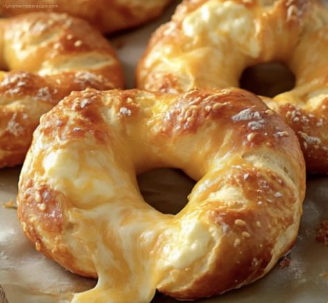 Enjoy these homemade Cheese-Stuffed Pretzels, featuring a soft, chewy pretzel dough filled with a gooey blend of cheddar and mozzarella cheeses, baked to golden perfection. Cheese Stuffed Pretzels, Stuffed Pretzel Bites, Pretzels Bites, Stuffed Pretzels, Baked Cream Cheese, Cream Cheese Spaghetti, Baked Cream Cheese Spaghetti, Homemade Naan Bread, Baked Pretzels