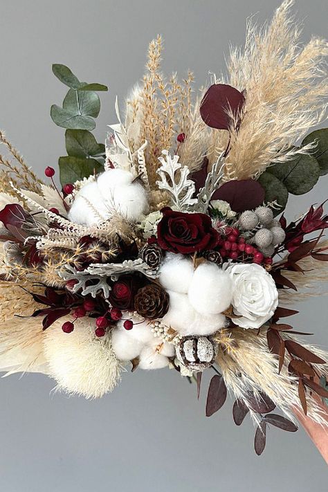 One garden wedding bouquet is elegant for your special day. Our style experts love this for enhancing your wedding look. Collect this to your garden wedding ideas. Winter Boho Wedding, Bridal Bouquet Winter, Bridesmaid Winter, Winter Bridesmaid, Christmas Dinner Decorations, Winter Bridal Bouquets, Garden Wedding Bouquet, Winter Bridesmaids, Flower Cake Toppers