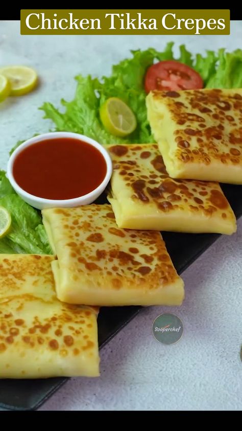 Indulge in the perfect blend of Pakistani and French cuisine with our mouthwatering Chicken Tikka Crepes. This delicious and mouth-watering snack is ready to accompany you at iftar. Try out these Chicken Tikka Crepes and let us know how they turned out.  #ChickenTikkaCrepes #Crepes #ramzanrecipes #FarmtoTableFreshStarterIdeas Easy Iftar Recipes, Ramzan Recipe, Chicken Starter Recipes, Iftar Recipes, Vegetarian Fast Food, Tastemade Recipes, Sweet Dishes Recipes, Tasty Recipes Videos, Quick Recipes Snacks