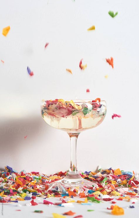 Confetti falling into glass of champagne into a vintage glasse Confetti Branding Photo, Confetti Product Photography, Confetti Pictures, New Year Journal Prompts, Aesthetics Branding, Year Journal Prompts, Champagne Confetti, New Year Journal, Confetti Falling