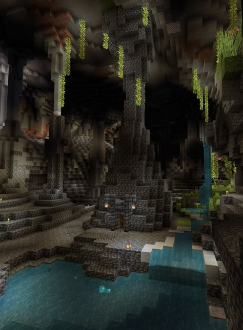 Here's a quick storage base we built down in the deep caves. We expanded the existing deepslate stalagmite and then added the chests inside. Minecraft Caves And Cliffs, Minecraft Cave Base Ideas Interior, Minecraft Underground Ideas, Minecraft Deepslate Cave Base, Lush Cave Base, Minecraft Dragon Cave, Cave Builds Minecraft, Lush Cave Base Minecraft, Cave Minecraft Ideas