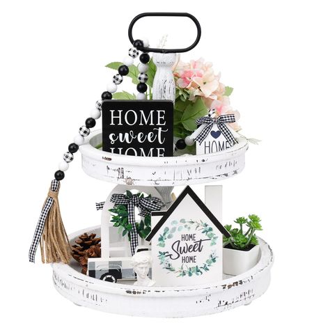 PRICES MAY VARY. Package Includes: This package contains a farmhouse two-tiered tray and 5pcs of wooden signs and beads (sweet home sign*1, Cathedral arch window*1, wooden truck*1, house-shaped sign*1, wooden bead garland with tassel*1). Dimension: The height of this tray is 15.75” in total (7.87” of each layer). The diameter of the bottom tray is 13.39��” and the diameter of the top tray is 9.84”. These wooden signs all fit the tray well. They are in harmony with each other to make an impressive Buffalo Plaid Decor, Table Decor Living Room, Plaid Decor, Wooden Bead Garland, Kitchen Table Decor, Rustic Kitchen Decor, House Decorations, Decor Bundle, Decorative Trays