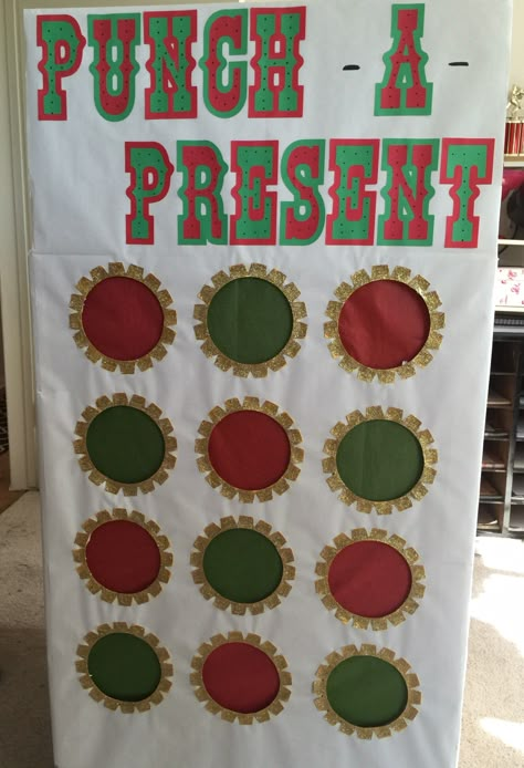 Punch-a-Present Christmas Eve game with 12 compartments for party favor prizes. #pinterestcometolife #christmas #diy #crafts Christmas Prize Punch Board, Punch A Present Diy, Christmas Party Favors For Family, Party Game Gift Ideas, Punch A Prize Christmas, Punch Prize Board Diy, Funny Game Prizes, Office Christmas Party Favors, Christmas Prizes For Adults