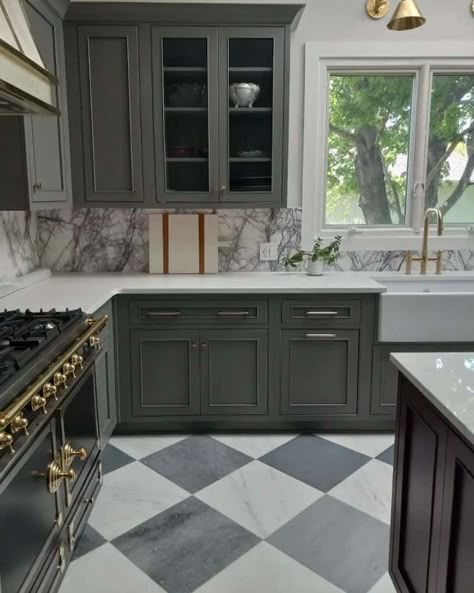 Where to use the checkerboard floor trend in your home - Farmhousehub Checkerboard Kitchen Floor Tile, Green Cabinets Black And White Floor, Modern Checkered Floor Kitchen, Black And White Checked Kitchen Floor, Checkered Floor Game Room, Kitchen Checked Floor, Kitchen Tile Floors Ideas, Kitchens With Checkerboard Floors, Green Kitchen Cabinets Checkered Floor