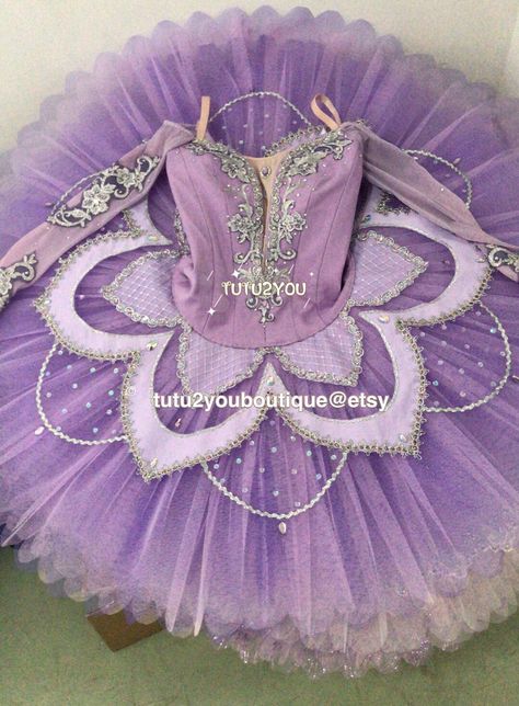 Purple professional tutus decorated with beads and laces which give it a rich and vivid feeling. Perfect for Lilac fairy and Medora variations and many other classic ballet roles. There might be minor variation in final product due to lace batch changes. Please provide the following measurements: 1. Height (cm) 2..Weight (kg) 3. Bust (cm) - #8 line in photo 4. Waist (cm) - #10 line in photo 5. Hips (cm) - #13 line in photo 6. Length of upper body - #11 line in photo 7. Girth (cm) Snow White Tutu, Tutu Pattern, Lilac Fairy, Dance Costumes Ballet, Classical Ballet Tutu, Purple Tutu, Ballerina Costume, Ballet Performances, Ballet Inspiration