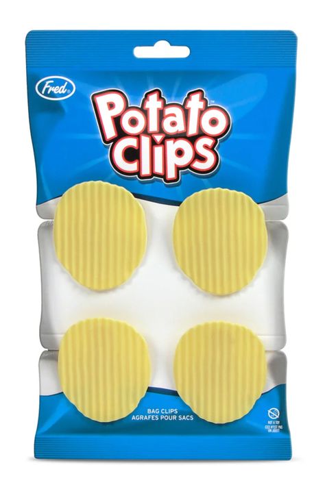 Keep your snacks fun and fresh with this trompe l'oeil potato chip bag clip! Fred's POTATO CLIPS is a set of 4 bag clips that are so handy we bet you can't use just one! The realistic wavy potato-chip clip is double sided and is constructed from durable ABS plastic. Material: ABS Plastic, Stainless Steel* Design by: Charlotte Saul, Fred Studio Chip Clips, Mirrored Picture Frames, Puppet Toys, Gourmet Treats, Potato Chip, Stocking Stuffers For Kids, Beer Cocktails, Business Card Cases, Bag Clips