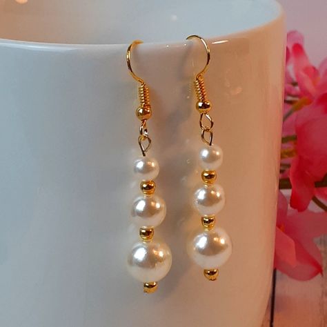 Cream Pearl Gold Plated Dangle Drop French Wire Earrings Artisan Handmade By Me 8,6,4mm Round Beads, Abs Simulated Pearls 3mm Gold Filled Beads Hypoallergenic, Nickel Free 2 Inch Length 8mm Width These Amazing Earrings Will Compliment Any Outfit. Makes A Great Gift. Thanks For Looking. Have An Amazing Day. Etsy 40 #Handmadeearrings #Earrings #Jewelry #Handmade #Handmadejewelry Unique Handmade Jewelry Vintage, Pearl Fine Jewelry, Pearl Earrings Making At Home, Gold Pearl Earrings Dangle, Wire Bead Earrings Diy, Pearl Wire Jewelry, Handmade Drop Earrings, Handmade Bead Earrings, Diy Gold Earrings