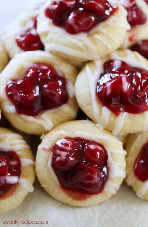 Cherry Pie Cookies - These cookies are made with sugar cookie dough and feature cherry pie filling. Our family loves these cookies! #cookies #cherrypie #dessert Group Dessert, Thumbprint Cookies With Icing, Cookies Thumbprint, Cherry Pie Cookies, Almond Sugar Cookies, Cookies Chewy, Make Dessert, Sour Cherries, Canning Cherry Pie Filling