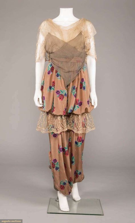 Embroidered net draped bodice to caped sleeve w/ grey silk crepe bias draped over-panel, light cinnamon silk w/ stylized tulip bouquet pattern Turkish pants w/ bloused overskirt & embroidered net ruffle, pleated & inset ankle cuff w/ 2 decorative self-covered buttons, Poiret inspired, B 35", W 27", L 57" Silk Harem Pants, Victorian Gown, Paul Poiret, Historical Costuming, 1910s Fashion, Draped Bodice, Wrap Pants, Tulip Bouquet, Panel Light