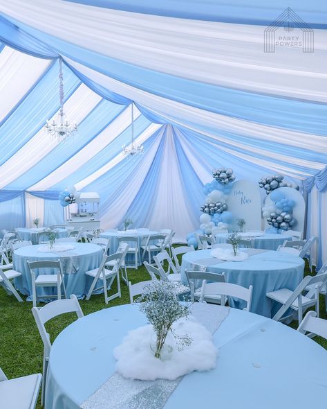 30x40 Tent and Drapes for Baby Rico’s Baby Shower 💙 . Rentals : 30x40 tent and drapes with silver chandeliers Candy Cart with Silver Dessert Stands and Balloons Arch Walls with Balloons and Custom Vinyl Sign Round tables with tablecloth and white padded chairs . Client provided table decor 💙 . #tent #draping #babyshower #blue #white #party #rentals Tent Draping, Baby Shower Chair, Dessert Stands, Balloons Arch, Round Table Decor, Round Table And Chairs, Blue Drapes, Quinceanera Dresses Blue, Quinceanera Decorations