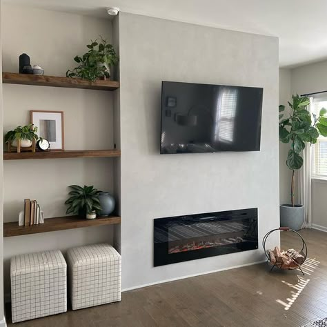 Tv Simple Wall Design, Cement Electric Fireplace, Living Room Tv Wall With Electric Fireplace, Simple Media Wall Design, Small Fireplace Wall, False Chimney Breast With Tv, Floating Shelves Fireplace Surround, Tv Chimney Wall, Tv Bigger Than Fireplace