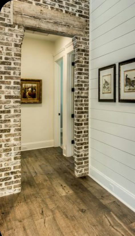 Brick Around Doorway, Shiplap And Brick Wall, Brick Wall In Basement, Brick Room Divider, Brick Doorway Interior, Brick Archway In Living Room, Brick Entryway Wall, Brick Columns Interior, Indoor Brick Wall