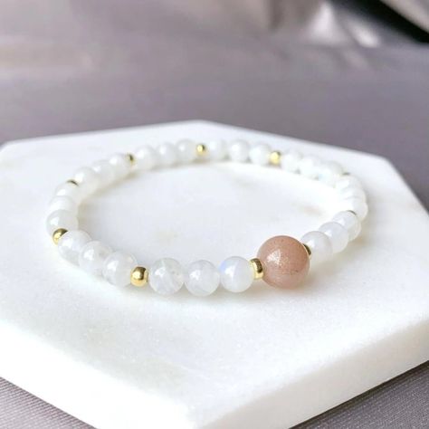 Enhance your personal energy and protect your space with the Sunstone & Moonstone Gold Beaded Bracelet. Spiritual Gold Beaded Bracelets With Moonstone, White Beaded Moonstone Crystal Bracelet, Spiritual Moonstone Gemstone Beaded Bracelets, Spiritual Moonstone Bracelets With Faceted Beads, White Moonstone Crystal Bracelet, Hand-strung, Sunstone Moonstone, Gold Beaded Bracelet, Personal Energy, Crystal Jewellery