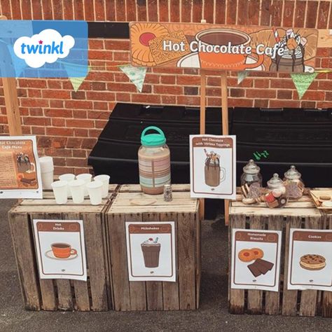 We're obsessed with this hot chocolate cafe that Lampton Park Preschool have created 😍 The campfire is a great final touch too 🔥 We’ll be over for a (socially distanced) cup of hot chocolate soon 😉💙  If you're inspired to create your own, click to download our Hot Chocolate Cafe role play pack, it has everything you need to set up shop. 

#hotchocolate #cafe #teachingresources #teaching #teacher #twinkl #twinklresources #eyfs #earlyyears #eyfsteacher #classroomideas #classroleplay #parents Cafe Eyfs Role Play, Preschool Cafe Dramatic Play, Coffee Shop Role Play Eyfs, Hot Chocolate Role Play Eyfs, Gruffalo Cafe Role Play, Christmas Roleplay Eyfs, Cafe Role Play Area Eyfs, Cafe Nursery, Cafe Role Play Area