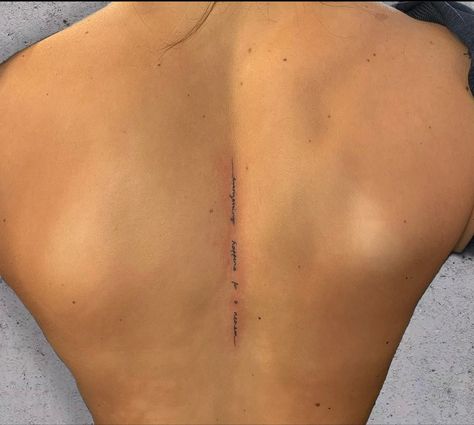 Vertical Tattoos For Women Back, Small Writing Spine Tattoo, Middle Spine Tattoos For Women, Script Down Spine Tattoo, Small Spine Tattoos For Women Quote, Fine Line Back Tattoo Women Spine, Mini Spine Tattoo, Short Spine Tattoo, Back Tattoo Women Fine Line