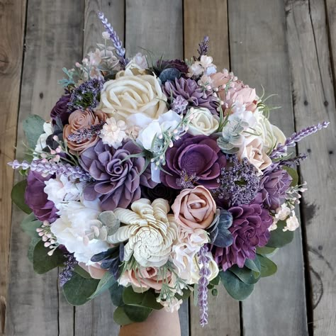 💥ALL SALES ARE FINAL💥 Wood Flower Bouquet, Purple Bridal Bouquet, Lavender Wedding Bouquets, Purple Wooden Flower Bouquet, Lavender Wood Wedding Flowers 🖌flower colors include cream, purple, dusty lavender, light pink, and blush 🤚handle is fully wrapped in twine with a cream ribbon overlay and stems are hidden underneath with artificial silver dollar eucalyptus 💐1st image shows our XLarge 12" bouquet 🥀cascading bouquet diameter is taken at the widest point at the top 📚PLEASE READ📚 •IMPOR Lavender Flower Bouquet, Christmas Wedding Bouquets, Wooden Flower Bouquet, Lavender Wedding Bouquet, Flower Bouquet Delivery, Lavender Bridal Bouquet, Purple Bridal Bouquet, Wood Flower Bouquet, Silk Hydrangeas