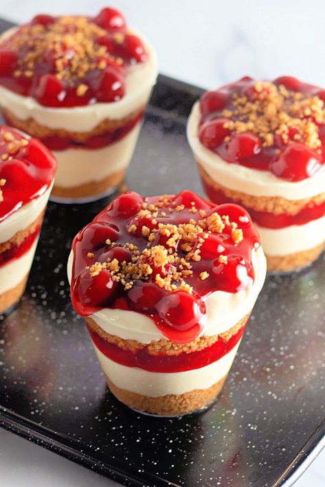 Mini Cherry Cheesecake Trifle Mini Trifle Recipes, Cherry Cheesecake Mini, Cherry Cheesecake Trifle Dessert, Individual Cherry Cheesecake Cups, Cherry Cheesecake Cups, Layered Cheesecake Cups, Mini Trifles, Strawberry Cheesecake Trifle, Individual Trifle Desserts Cups