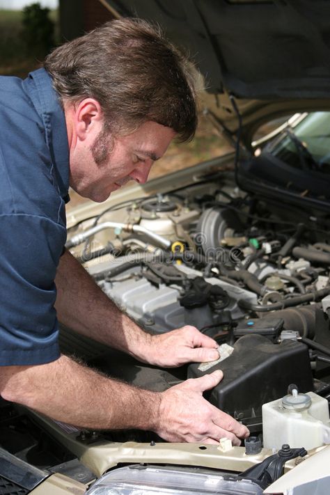 Auto Mechanic Working. An auto mechanic working on a car , #AFFILIATE, #Working, #Mechanic, #Auto, #auto, #car #ad Mechanic Working On Car, Mechanics Photography, Mobile Mechanic, Mechanic Shop, Car Workshop, Auto Mechanic, Lil Durk, New Photo Download, White Car