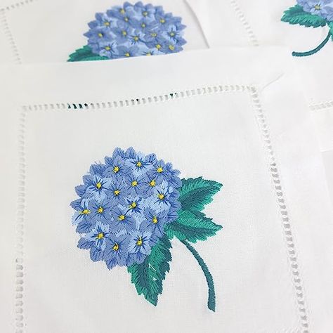 Elevate your entertaining with HCRAFT Embroidered White Cocktail Napkins! ✨🍹 This set of 6"x6" cloth napkin coasters features beautiful hydrangea embroidery, adding a touch of elegance to your Christmas cocktail parties or any special occasion. The ladder hemstitch detailing adds a sophisticated finish to these napkins🌸🎉 #HCRAFT #EmbroideredNapkins #CocktailNapkins #ClothNapkins #HydrangeaEmbroidery #LadderHemstitch #EntertainingEssentials #TableDecor #PartyIdeas #TrendingHomeGoods Embroidery Hydrangea, Hydrangea Embroidery, Napkin Embroidery, Embroidered Cocktail Napkins, Christmas Cocktail Party, White Cocktails, Christmas Cocktail, Hem Stitch, White Cocktail