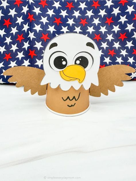 "The Eagle Paper Cup Craft is a fun and creative way to keep kids entertained while waiting for the Fourth of July celebrations. This craft is perfect for children of all ages, as it is easy to make and requires only a few materials like paper cups, construction paper, glue, and scissors. With a few simple steps, kids can transform an ordinary paper cup into a patriotic symbol of freedom that they can proudly display alongside other decorations. So, gather the supplies and encourage your little Eagle Craft, Paper Cup Crafts, Happy Eid Al Adha, Patriotic Symbols, Footprint Craft, Puppets For Kids, Special Gifts For Mom, Mouse Crafts, Cup Crafts