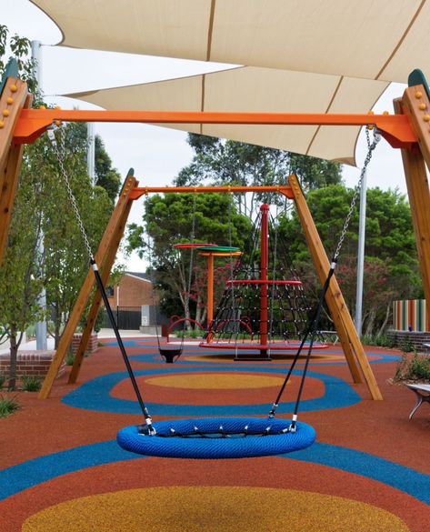 Colourful swing sets in playground Playground Swings, Playground Design, Play Spaces, Totem Pole, Porch Swing, Landscape Architecture, Outdoor Bed, Outdoor Furniture, Outdoor Decor