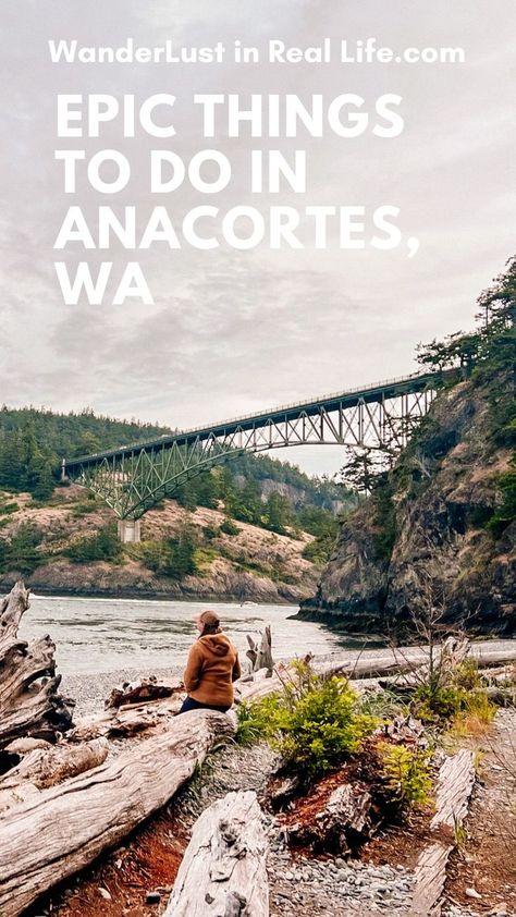 Woman with back facing wearing a baseball hat and fleece sitting on a log that has been washed by the water near the waters edge with deception pass bridge near Anacortes, WA and Whidbey island in the background. Words on screen read "WanderLust in Real Life.com Epic Things to do in Anacortes, WA" Anacortes Washington Things To Do, Burlington Washington, State Bucket List, Oregon Coast Roadtrip, Washington Things To Do, Anacortes Washington, Things To Do In Washington, Washington Travel, Rv Adventure