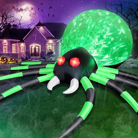 12 feet giant inflatable spider with rotating green light] Built-in cool rotatable LED lights, huge body with flashing green light, glowing red eyes, long fangs, black and green legs make the spider look more real , even more terrifying. It will be a visual feast for your neighbors and guests. This Giant Halloween Inflatable Spider is sure to be a hit at any Halloween party! Halloween Yard Inflatables, Red Glowing Eyes, Glowing Red Eyes, Halloween Blow Ups, Yard Inflatables, Green Spider, Halloween Spider Decorations, Glowing Eyes, Outdoor Inflatables