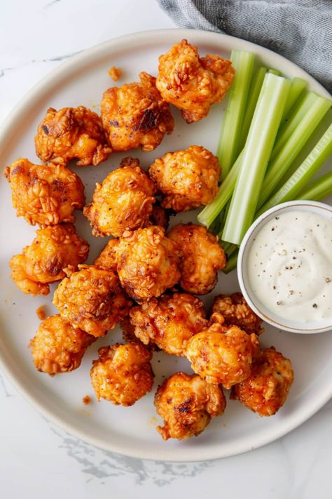 Spice up your game day spread with these buffalo chicken bites! From the crispy coating to the spicy sauce, they're the ultimate bite-sized appetizer. Easy Indian Appetizers, Creamy Buffalo Chicken, Buffalo Chicken Bites, Easy Buffalo Chicken, Buffalo Chicken Pasta, Bite Size Snacks, Chicken Ideas, Delicious Appetizer Recipes, Chicken Bites