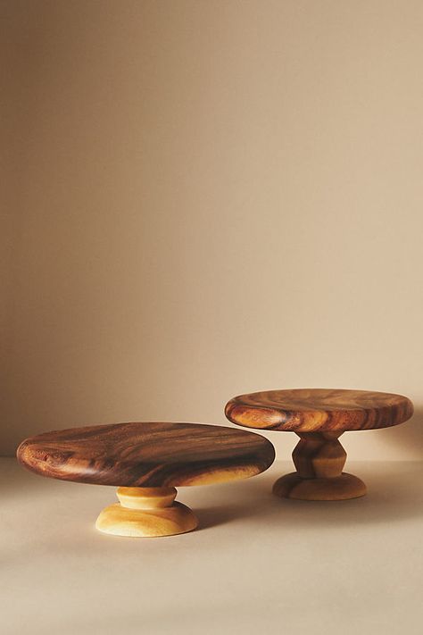 This wooden cake stand features hardcarved details that showcase the natural wood grain for a dash of rustic elegance. | Carolina Cake Stand by Anthropologie, Size: Small Wood Plates Ideas, Small Wood Turning Projects, Wooden Wedding Cake Stand, Cake Stand Wooden, Wooden Plates And Bowls, Rustic Wooden Signs, Wooden Cake Stand, Tiered Cake Stands, Cake Stand Decor