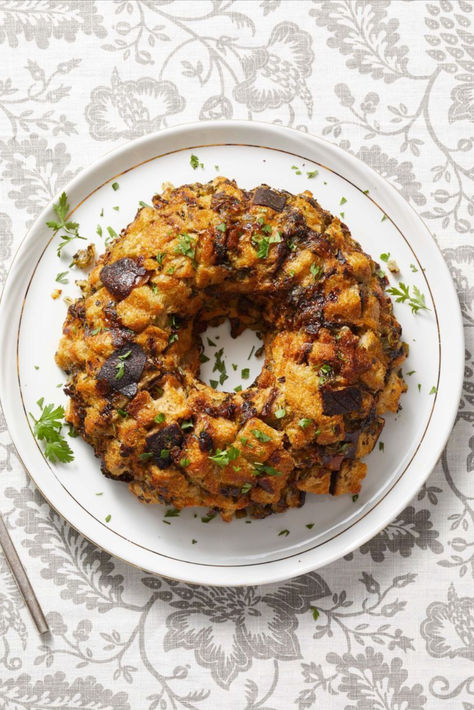 There's only one word for this Thanksgiving side dish: show-stopping. All the flavors of stuffing, but it comes together in a bundt pan for that extra something special. Traditional Thanksgiving Dinner Menu, Holiday Roast, Traditional Thanksgiving Dinner, Traditional Turkey, Bread Stuffing, Best Thanksgiving Side Dishes, Holiday Roasts, Herb Stuffing, Thanksgiving Dinner Ideas