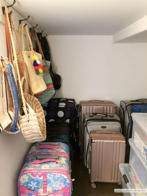 Organized Luggage Closet (& outdoor favorites!) - The Sunny Side Up Blog Luggage Organization Storage, Duffle Bag Storage Ideas, Duffel Bag Storage Organization, Storing Luggage At Home, Organize Luggage In Closet, Suitcase Storage Ideas Closet, Storing Suitcases Storage Ideas, How To Store Luggage At Home, Luggage Storage Ideas Small Spaces