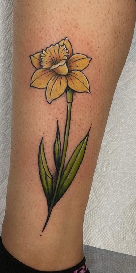 Neo Trad Daffodil, Daffodil Color Tattoo, Traditional Narcissus Flower Tattoo, Daphodile Flower Tattoo, Dafodill Flowers Tattoo Design, Neotraditional Daffodil Tattoo, Color Daffodil Tattoo, Lego Flower Tattoo, Daffodil Finger Tattoo