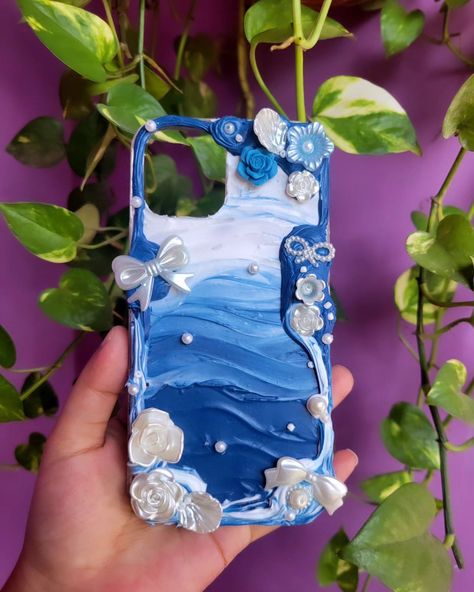 Decoden phone case Iphone 12 pro Theme: Blue + White baroque theme DM to get yours🌷 . . . . Decoden,decoden phone case,customised phone cover,decoden,diy,phone case Bangladesh, phone cover, iphone, decoden diy,cream glue phone case . . . #diy #decodenphonecase #decodendaily #stationerybangladesh #stationeryhut #journalinspiration #decodenphonecover #decodenphonecasediy #decoden #phonecoverbangladesh #customisedcovers #customisedphonecase #stationeryhut #smallbusinessowners #smallbusiness #... Decoden Inspiration, Cream Glue Phone Case, Decoden Diy, Customized Phone Covers, Cream Glue, Diy Cream, Decoden Phone Case, Customised Phone Case, Cover Iphone