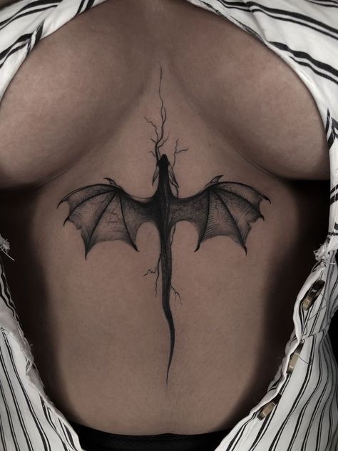 You know what's worse than having a messed up tattoo design on your skin forever? Getting called out about that epic fail online. Dragon Tattoo On Chest Women, Dragon On Stomach Tattoo, Tattoo Ideas Female Back Spine Dragon, Chest Tattoo Female Dragon, Dragon Spinal Tattoo, Dragon Lower Back Tattoo, Sternum Dragon Tattoo, Dragon Tattoo Sternum, Dragon Spine Tattoo For Women