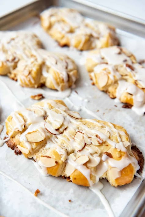 Almond Bear Claws are a flaky, buttery pastry that are filled with a sweet almond paste for a delicious breakfast treat or afternoon snack. We love them with a sweet glaze on top of the pastry for an extra layer of flavor and sweetness. If you're a fan of almond croissants or Danish pastries, then you're going to love this recipe that shows how to make almond bear claws at home. #bearclaws #pastry #bearclawpastry #almondbearclaws Almond Danish Puff Pastry, Bear Claw Pastry, Sourdough Bear Claws, Almond Paste Puff Pastry Recipes, Almond Bear Claws, Dutch Almond Pastry, Almond Croissant Cookie Recipe, Homemade Bear Claws, Almond Danish Pastry