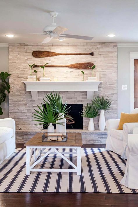 Palm-Inspired Beach and Coastal Decorating Ideas #beach #coastal #decoration #decorhomeideas Stacked Stone Fireplaces, Deco Marine, Beach House Interior Design, Coastal Living Rooms, Beach House Interior, Coastal Living Room, Beach Cottage Style, Fireplace Ideas, Stone Fireplace