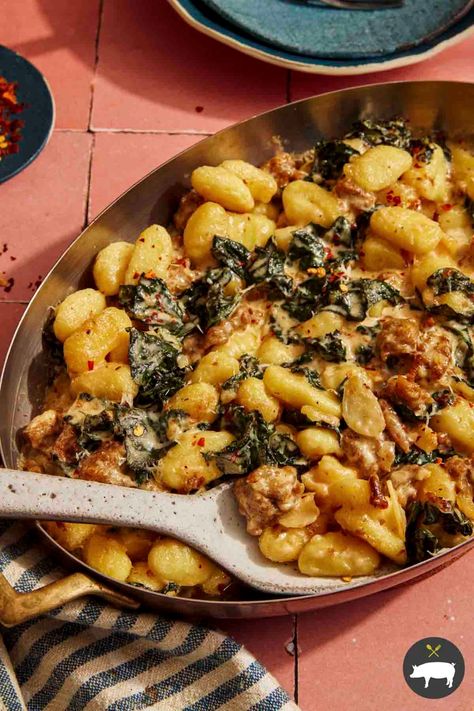 Our Baked Gnocchi with Sausage and Kale is a cozy, creamy dish with pillowy gnocchi, savory sausage, and tender kale, all baked in a rich Parmesan cream sauce. #gnocchi #bakedgnocchi #casserole #easydinner Sausage Kale Gnocchi Soup, Gnocchi Kale Recipes, Gnocci Bake, Baked Gnocchi Recipes, Bacon Kale, Gnocchi Dishes, Creamed Kale, Baked Kale, Pumpkin Gnocchi