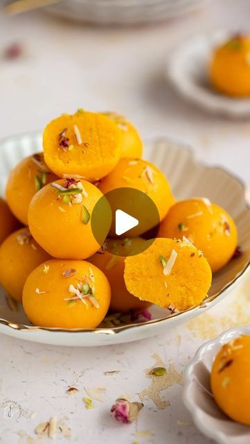 Hayley Dhanecha on Instagram: "Get the mango coconut badam ladoo recipe! Comment “ladoo” and you’ll receive a clickable recipe link in your DMs! Follow @jcookingodyssey for more Indian sweets recipes. 

These mango coconut ladoos have the addition of ground almonds, making them a luxurious treat. 

They’re beautifully soft and melt in the mouth. 

Recipe at https://www.jcookingodyssey.com/mango-badam-coconut-ladoo-season-of/

#mangoladoo #coconutladoo #indiansweets #ladoo #indiandessert" Indian Sweets Recipes, Coconut Ladoo Recipe, Coconut Ladoo, Ladoo Recipe, Recipes Snacks, Indian Dessert, Quick Recipes Snacks, Indian Dessert Recipes, Mango Coconut