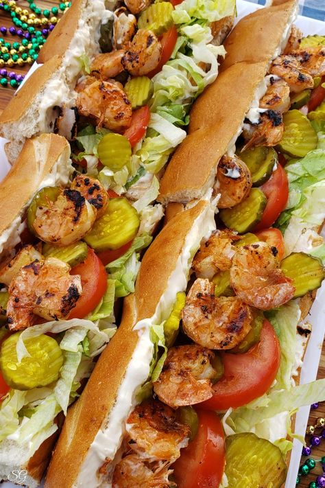 Click for this EASY grilled garlic shrimp po'boy sandwich recipe! (ad) Kinda-like you got in New Orleans, but with a twist. Grilled shrimp with Better Than Bouillon Garlic Paste makes this recipe simple. Toss it together in mere minutes!! #BTBGrillingRecipes #IC #neworleans #grilled #shrimp #poboys #delish #yum #foodie #recipe #easyrecipe Crawfish Po Boy Sandwich, Grilled Shrimp Poboy Sandwich, Poboy Shrimp Sandwich, Shrimp Poor Boy Sandwich Recipes, Summertime Dinner Ideas, Shrimp Po'boy Recipe, Shrimp Poboy Sandwich, Grilled Shrimp Sandwich, Po Boy Sandwich Recipe