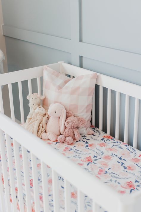 Step inside this gorgeous baby girl's nursery in soft blue and blush tones. Click through for the details. #nursery #babygirl #girlsroom #girlsnursery #girlnursery #girlroom #baby #newbaby | glitterinc.com | @glitterinc Pink And Blue Nursery Boy, Blue And Pink Nursery Girl, Blue Floral Nursery Girl, Pink And Blue Nursery Twins, Pink And Blue Nursery, White Crib Nursery, Whimsical Nursery Pink Blue, Solly Baby Wrap, Blue Nursery