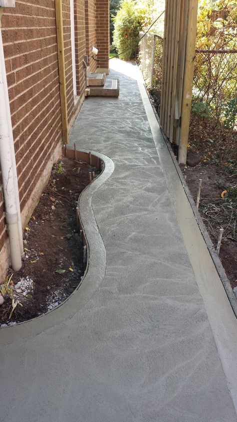 Decorative Concrete Walkway, Side House Walkway Ideas, Walkway Fence Ideas, Side Concrete Walkway, Concrete Path Side Of House, Concrete Side Of House, Concrete Sidewalk Around House, Concrete Walkway Around House, Sideyard Pathway Walkways