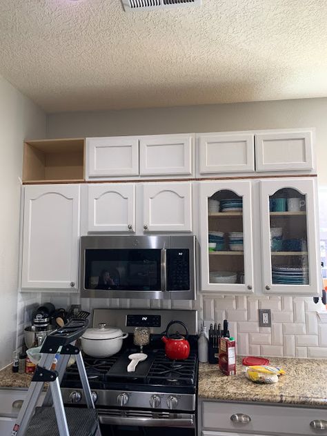 Adding a row of stacked cabinets Add Cabinets To Ceiling, Adding A Top Row Of Cabinets, Above The Cabinets, End Of Upper Kitchen Cabinet Ideas, Extending Upper Cabinets To Ceiling, Adding Storage Above Kitchen Cabinets, Open Soffit Above Kitchen Cabinets, Raise Kitchen Cabinets To Ceiling Add Shelf, Adding Cabinets To Existing Kitchen