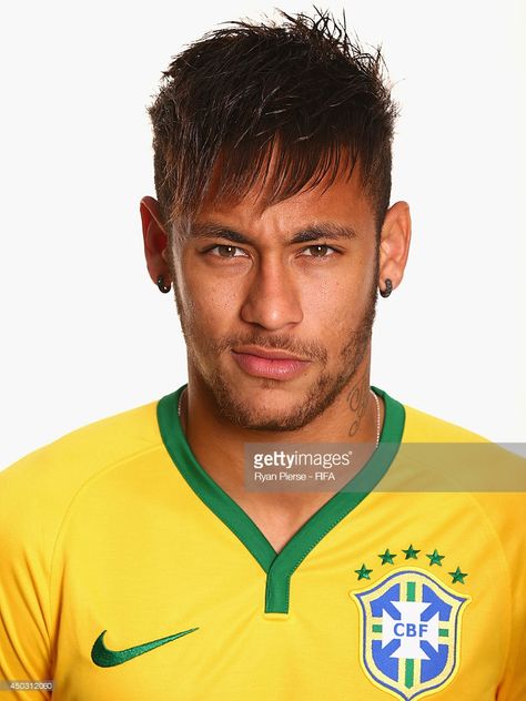 Neymar of Brazil poses during the official FIFA World Cup 2014 portrait session on June 8, 2014 in Rio de Janeiro, Brazil. Neymar Jr 2014, Neymar Jr Hairstyle, Brazil Football Team, Neymar Jr Wallpapers, Cr7 Messi, Ronaldo Football, Good Soccer Players, Celebrity Drawings, Soccer Goal