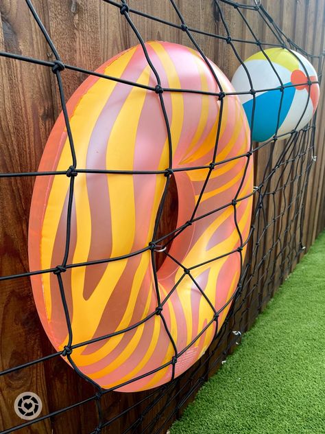 Pool toy hack 🏊🏻‍♀️ Have a fence? You can do this! #fence #backyardspace #pooltoys #pool🏊 #pooldesign #turf #bungee #goggles #floaties #pooldays #hacks #poolhacks #hooks #outdoorliving Follow my shop @MalloryKee on the @shop.LTK app to shop this post and get my exclusive app-only content! #liketkit #LTKhome #LTKswim #LTKSeasonal @shop.ltk https://liketk.it/46fD4 Diy Pool Float Storage Ideas, Cargo Net Pool Float Storage, Diy Pool Toy Storage, Floatie Storage, Storing Pool Floats, Pool Floaties Storage Ideas, Pool Toys Storage Ideas, Pool Toy Storage Ideas Diy, Pool Storage Ideas For Floats