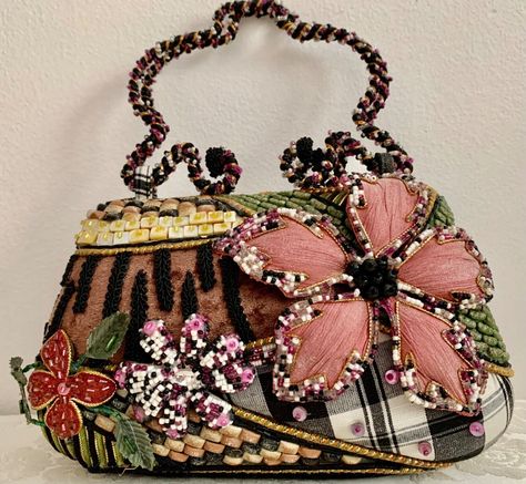 Mary Frances Beaded Unique Purse  Embellished  Hard Case Rare  Beaded handles Very Unique Purse Different on each side, see pictures 3D      Brand New 8 5" Long, 5" Tall not including handles Visit my ebay store, lots of Brighton and More! Will combine ship multiple items Mary Frances Purses, Rare Handbags, Mary Frances Bags, Mary Frances Handbags, Black Velvet Fabric, Butterfly Bags, Designer Clutch Bags, Mary Frances, Floral Purse