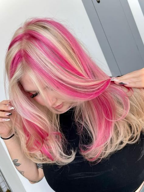 chunky pink highlights on blonde hair Blonde With Pink Chunky Highlights, Blond Hair With Pink Streaks, Blonde With Color Streaks, Pink Chunky Highlights In Blonde Hair, Coloured Streaks In Hair, Blonde Hair With Hot Pink Highlights, Chunky Pink Highlights In Blonde Hair, Chunky Highlights On Blonde Hair, Blonde With Pink Streaks