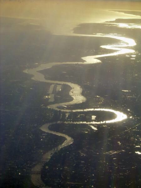 A view of the River Thames as it winds through London. You can see the loop of The Isle of Dogs and Canary Wharf, the Thames Barrier, then away towards the QEII bridge at Dartford where the river widens out and becomes the Thames Estuary. Thames Barrier, London Docklands, Isle Of Dogs, London Vintage, London Today, River Cruise, England And Scotland, London Town, River Thames